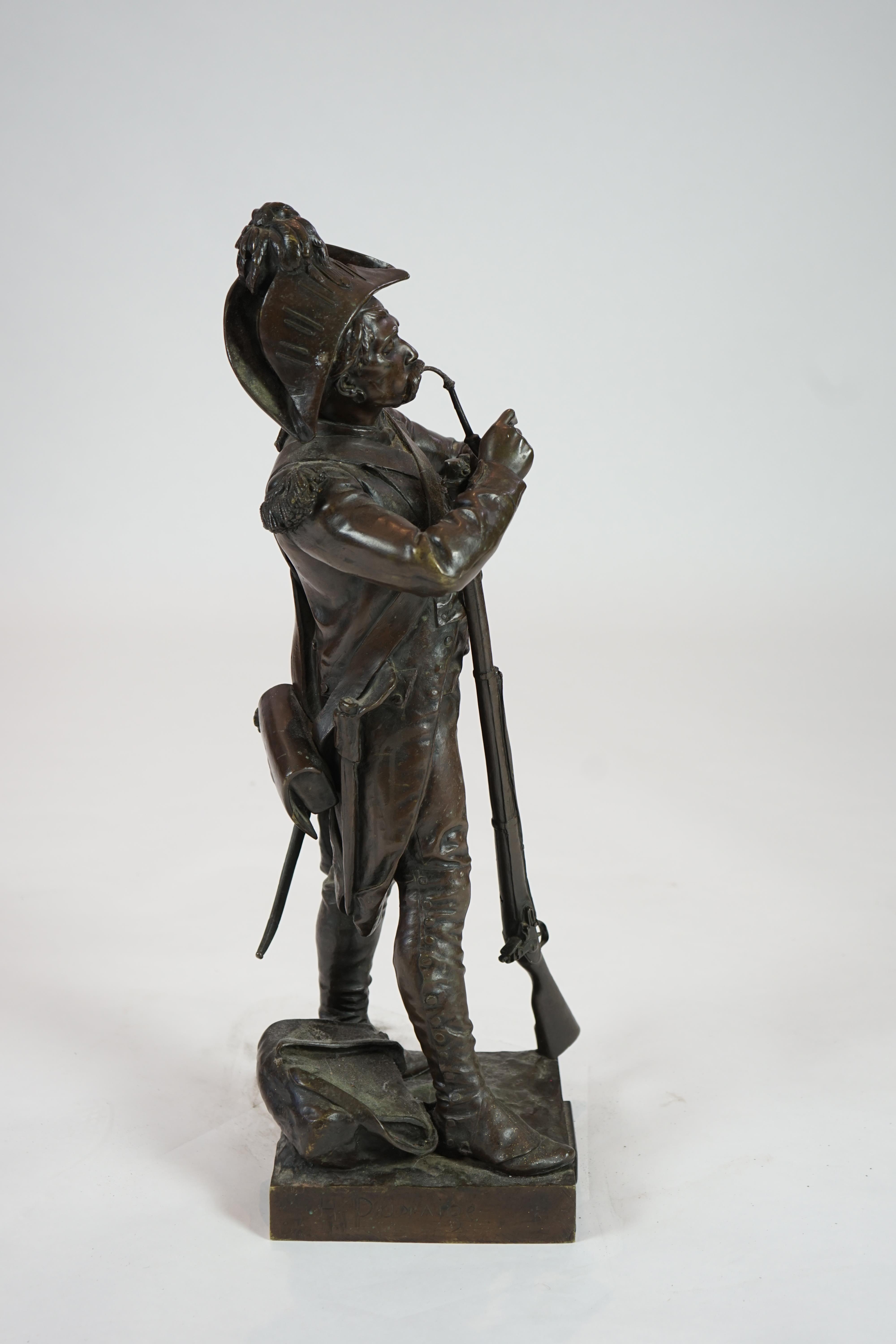 Henri Etienne Dumaige (French, 1830-1888), a bronze figure 'Apres le Combat Grenadier de 1792'